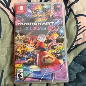 Nintendo Mario Kart 8 Deluxe - Vibrant Red and Blue. New.